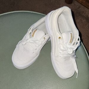 Puma White Athletic Shoes with Gold Accents